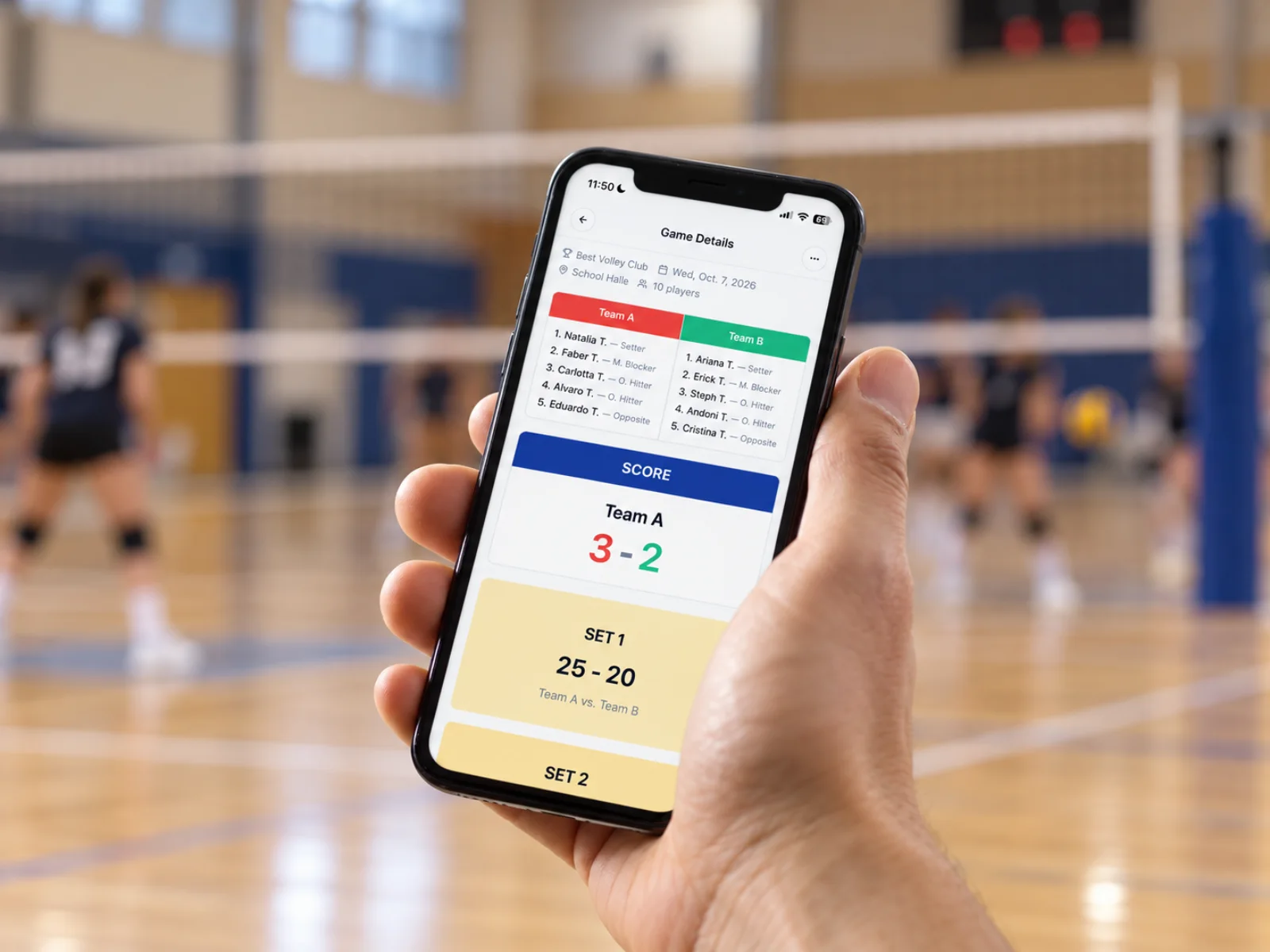 A hand holding a phone with the VolleySmart live score screen, in a volleyball hall